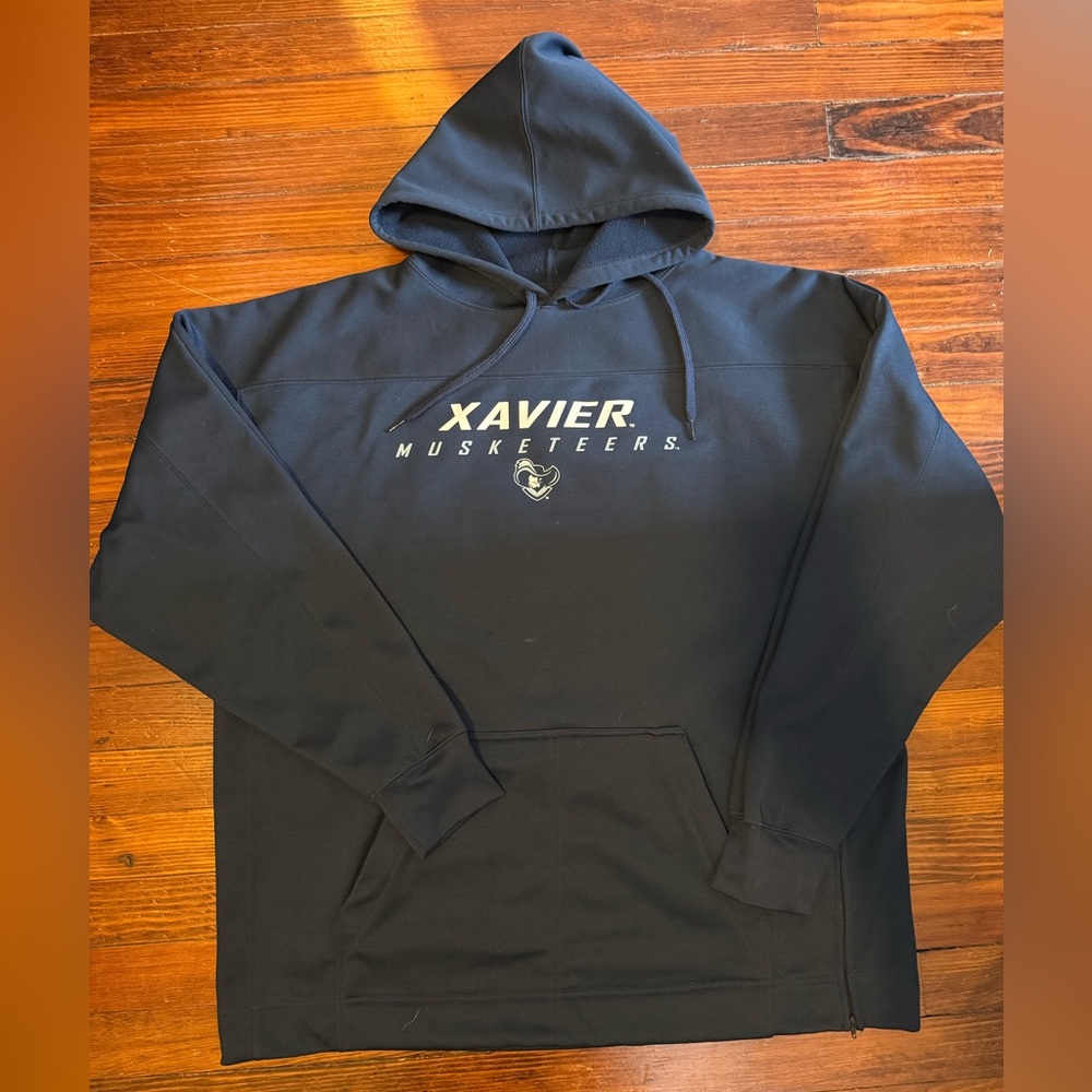 #627 Xavier Musketeers Dark Navy Blue Hoodie with zipper side.